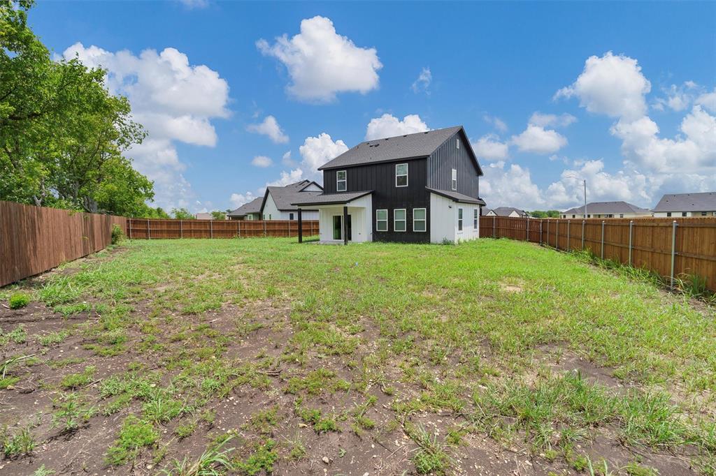 588 Highview Court Godley, TX 76044 - Photo 36 of 38 a view of a house with a yard and sitting area