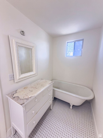 2454 East Old Wellington Road Price, UT 84501 - Photo 17 of 27 New Tile Flooring, Fresh Paint, Vintage Cabinet with Sink ( coming soon) Claw Foot Bathtub