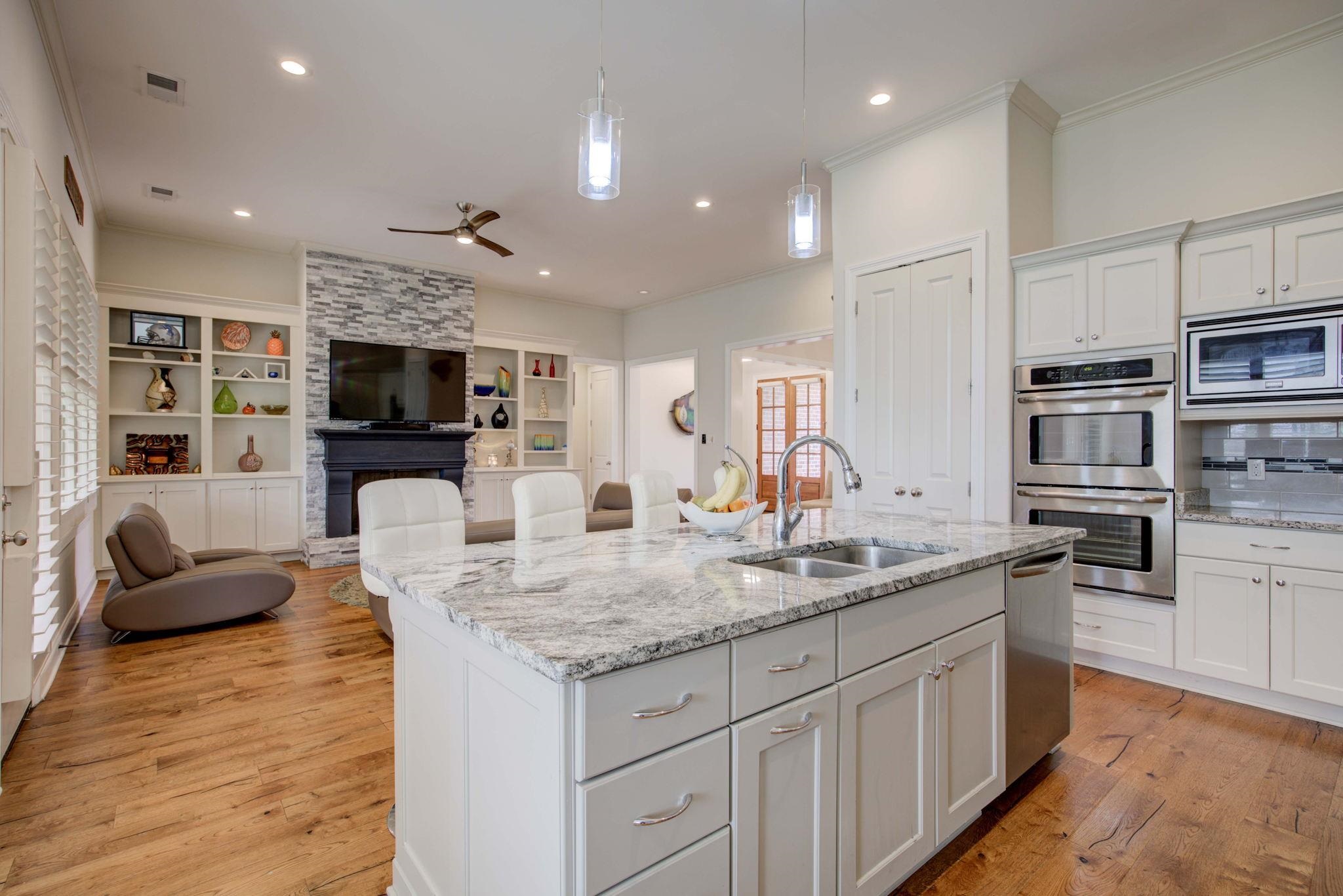 431 Kayley Cove Collierville, TN 38017 - Photo 11 of 24 a kitchen with kitchen island granite countertop a sink and appliances