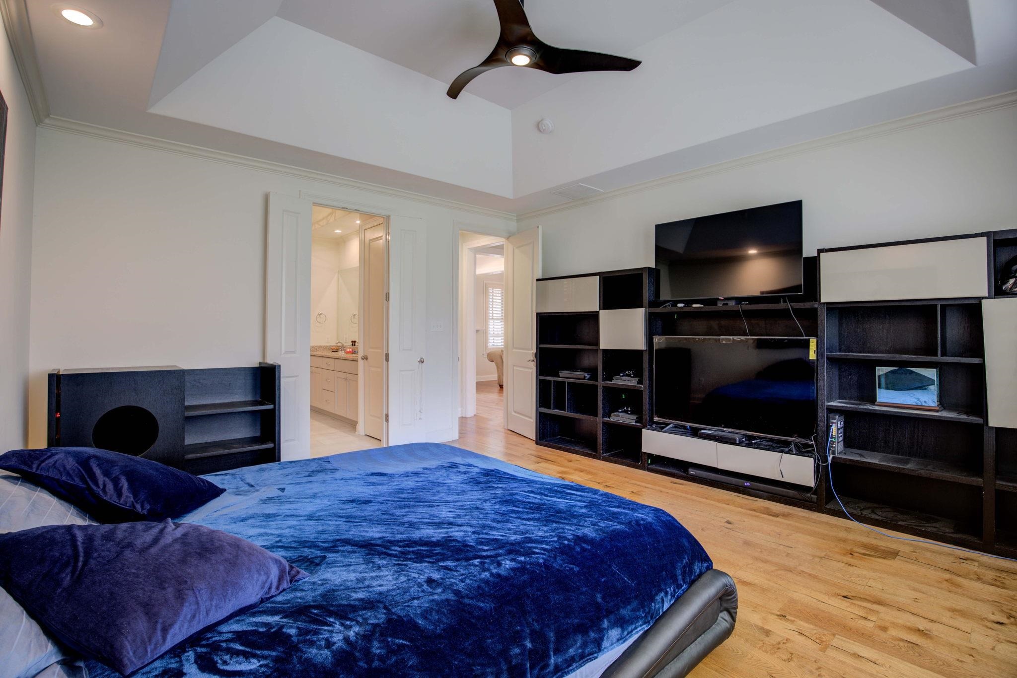 431 Kayley Cove Collierville, TN 38017 - Photo 12 of 24 a bedroom with a bed and a television