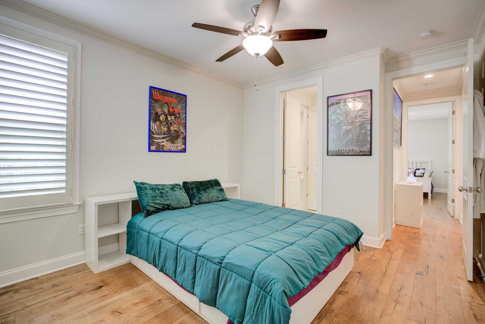 431 Kayley Cove Collierville, TN 38017 - Photo 14 of 24 a bedroom with a bed and a window