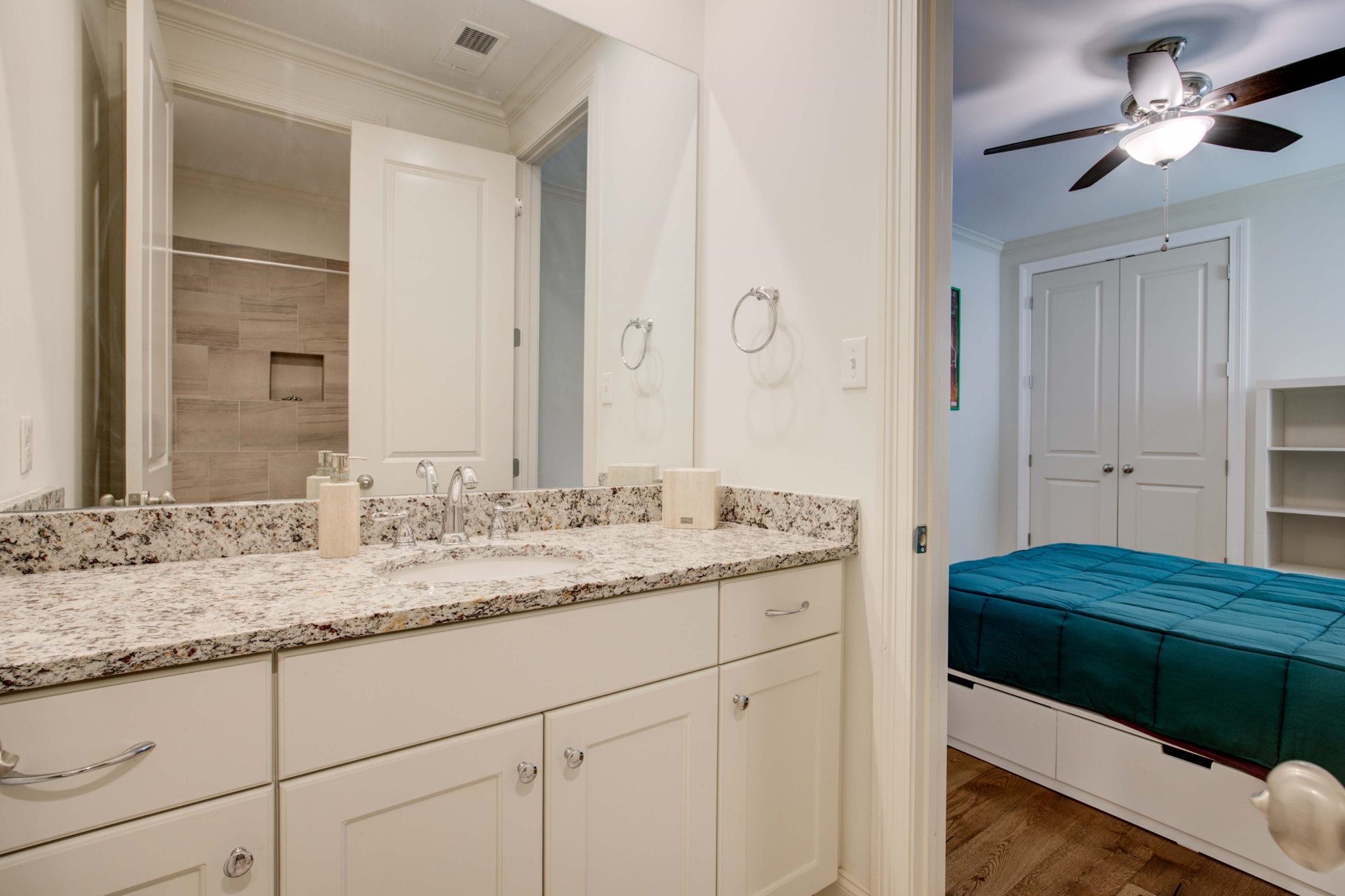 431 Kayley Cove Collierville, TN 38017 - Photo 15 of 24 a bathroom with a sink and a mirror