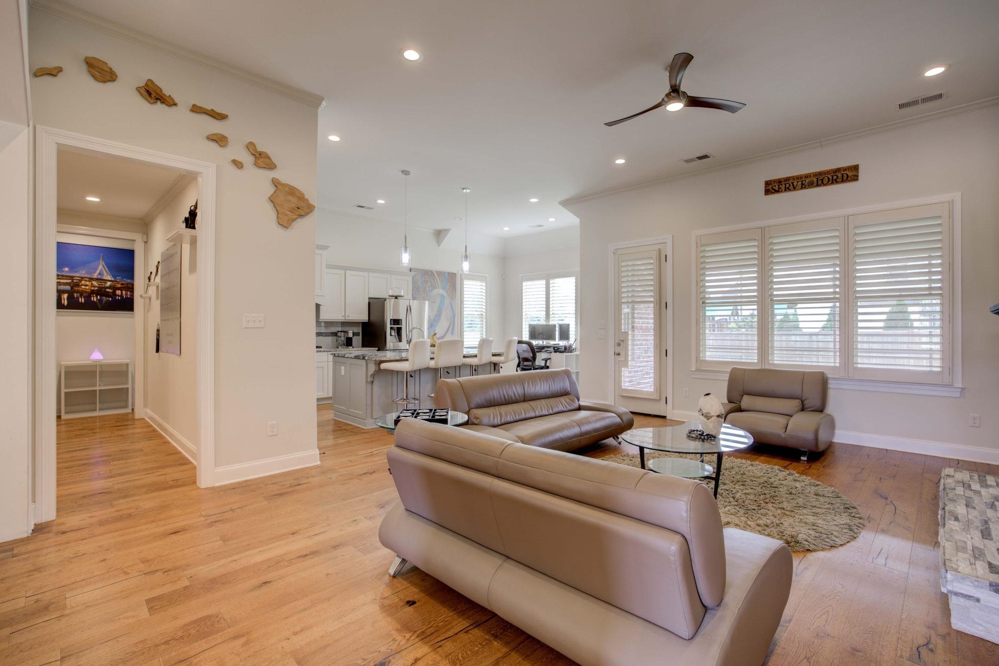 431 Kayley Cove Collierville, TN 38017 - Photo 9 of 24 a living room with furniture wooden floor and a large window