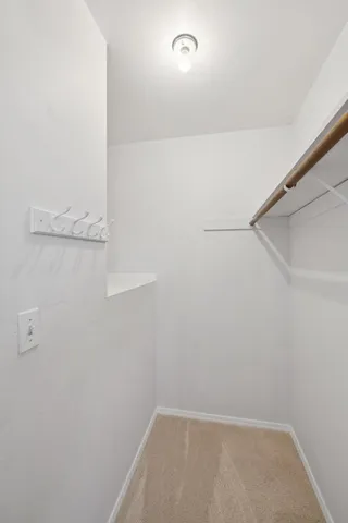 a view of small space with racks on the wall