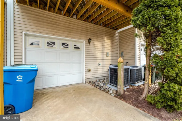 a view of a car park in front of house