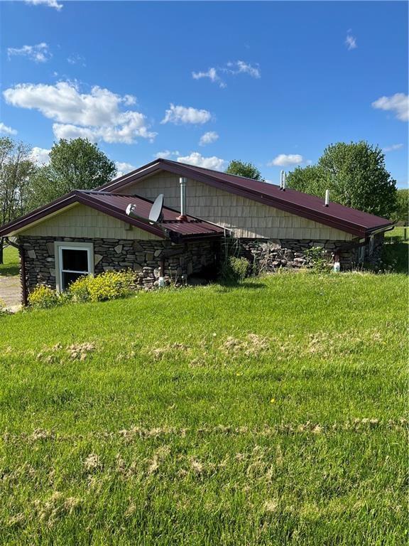 8018 De Villars Road Cochranton, PA 16314 - Photo 5 of 25 a front view of a house with garden