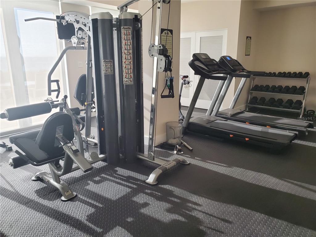 4401 Gulf Of Mexico Drive, Unit 703 Longboat Key, FL 34228 - Photo 17 of 23 a view of a room with gym equipment