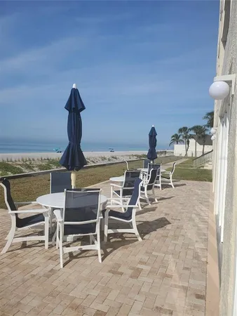 a view of a lounge chairs in the patio