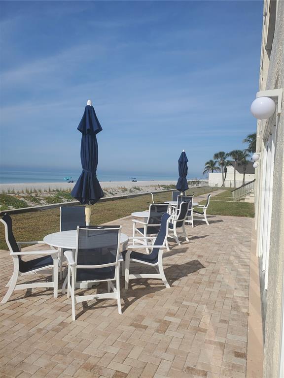 4401 Gulf Of Mexico Drive, Unit 703 Longboat Key, FL 34228 - Photo 22 of 23 a view of a lounge chairs in the patio