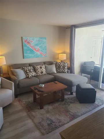 a living room with furniture and a couch
