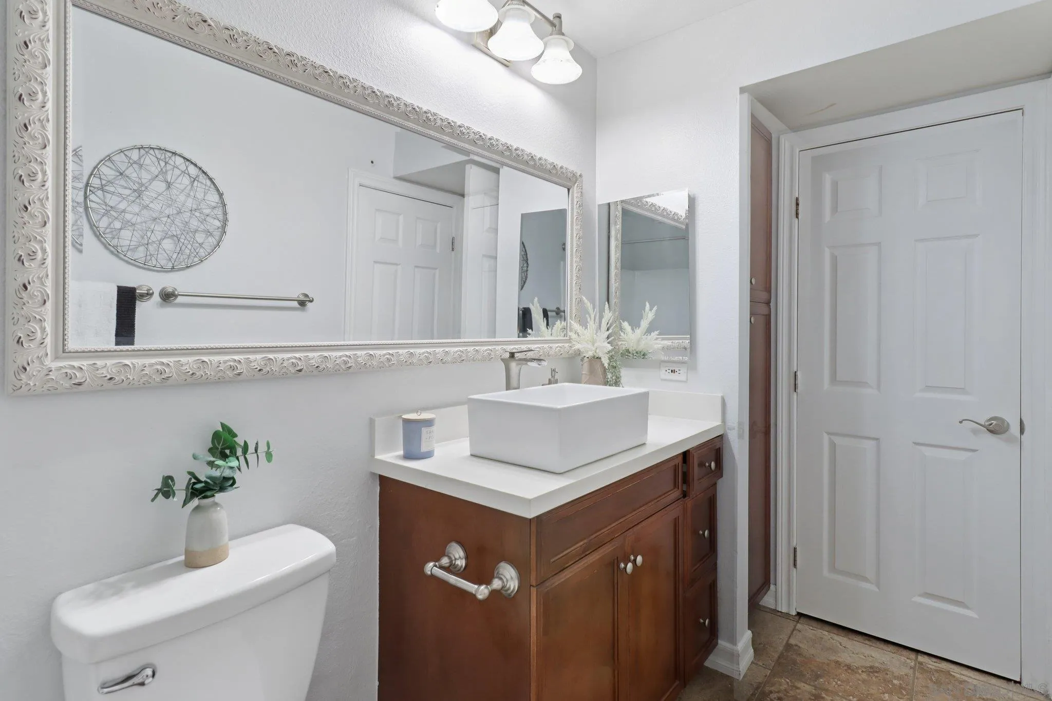 15373 Maturin Drive, Unit 178 San Diego, CA 92127 - Photo 24 of 61 a bathroom with a sink and a mirror