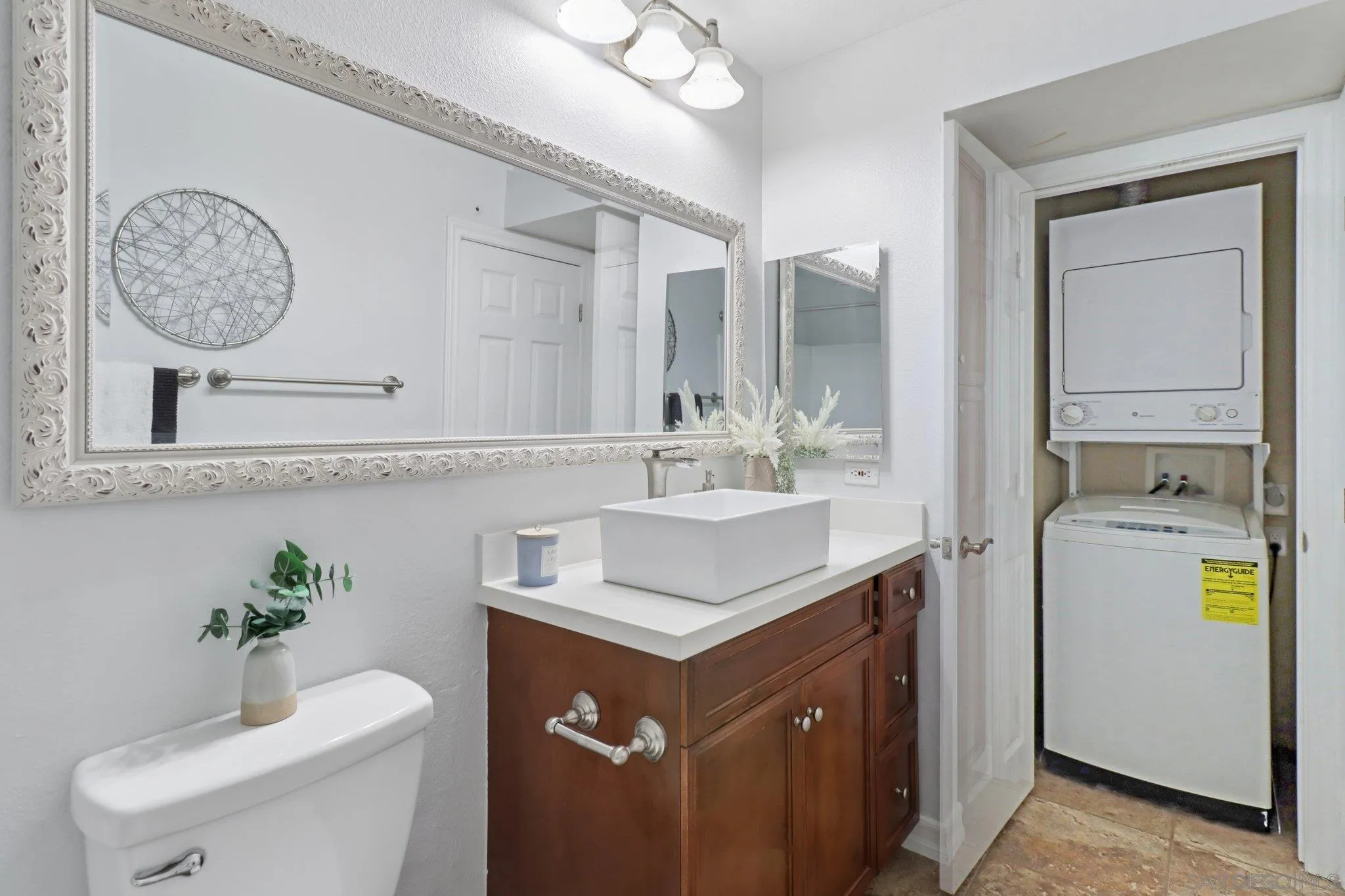 15373 Maturin Drive, Unit 178 San Diego, CA 92127 - Photo 25 of 61 a bathroom with a sink and a mirror
