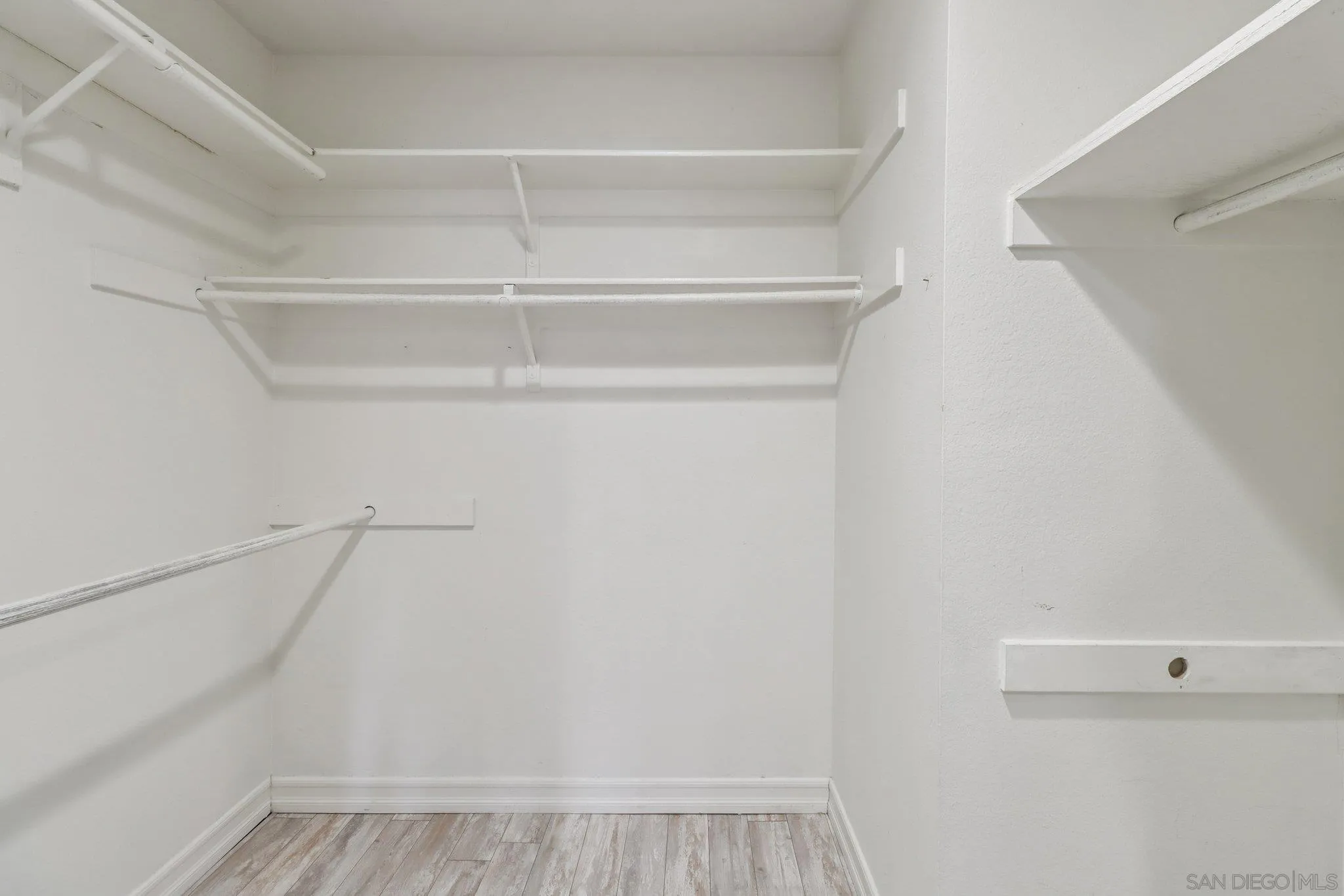 15373 Maturin Drive, Unit 178 San Diego, CA 92127 - Photo 26 of 61 a view of walk in closet with empty racks