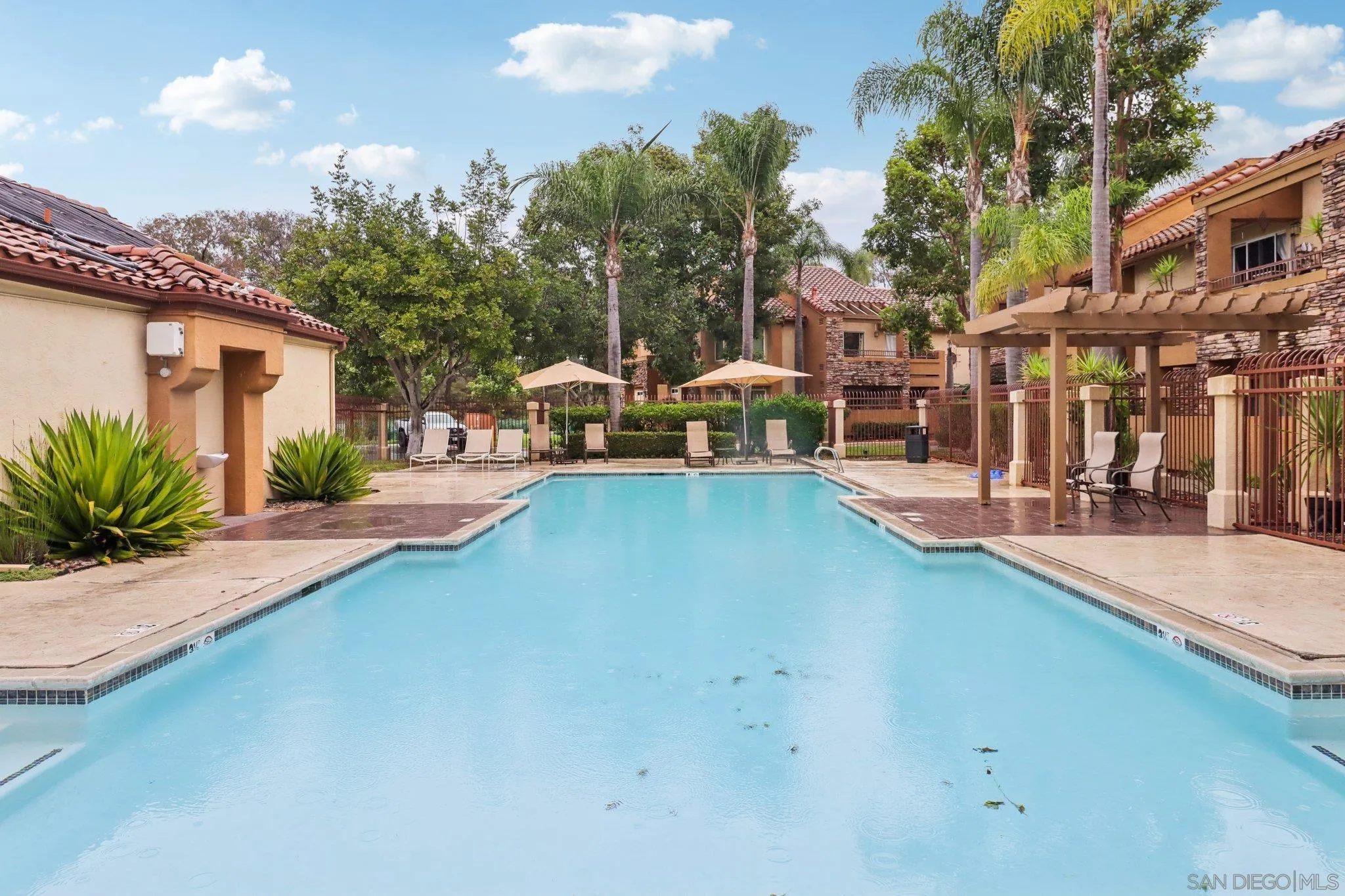 15373 Maturin Drive, Unit 178 San Diego, CA 92127 - Photo 39 of 61 a view of a house with backyard patio and swimming pool