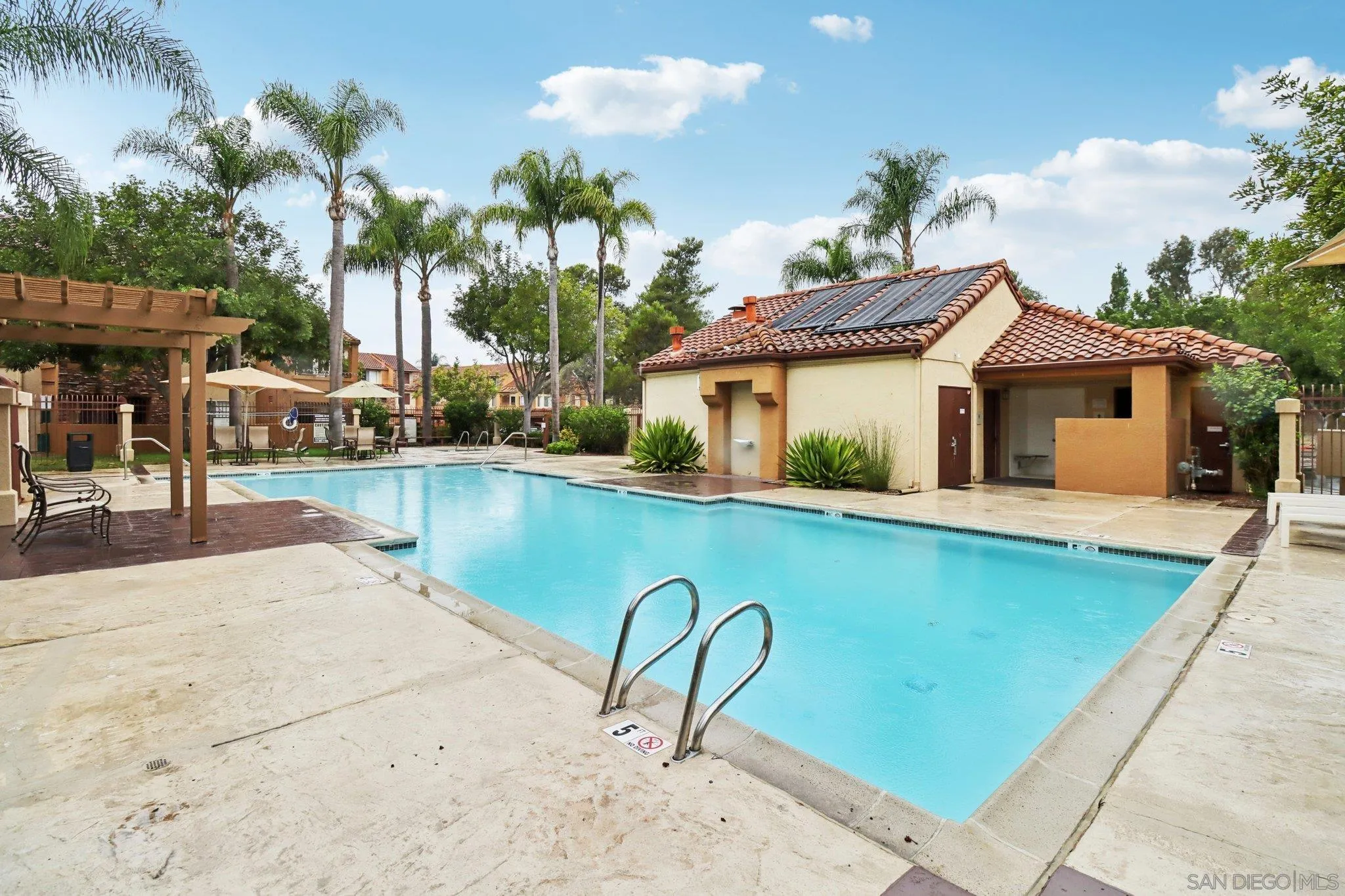 15373 Maturin Drive, Unit 178 San Diego, CA 92127 - Photo 40 of 61 a swimming pool with outdoor seating and yard
