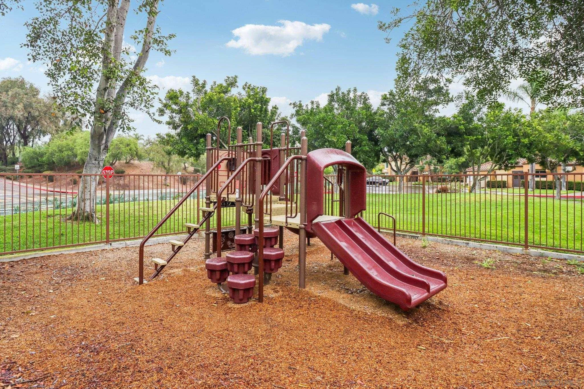 15373 Maturin Drive, Unit 178 San Diego, CA 92127 - Photo 43 of 61 a view of a park with slide