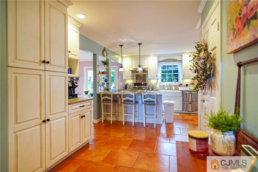 36 Starkin Road Edison, NJ 08837 - Photo 13 of 45 a lobby with furniture and potted plants