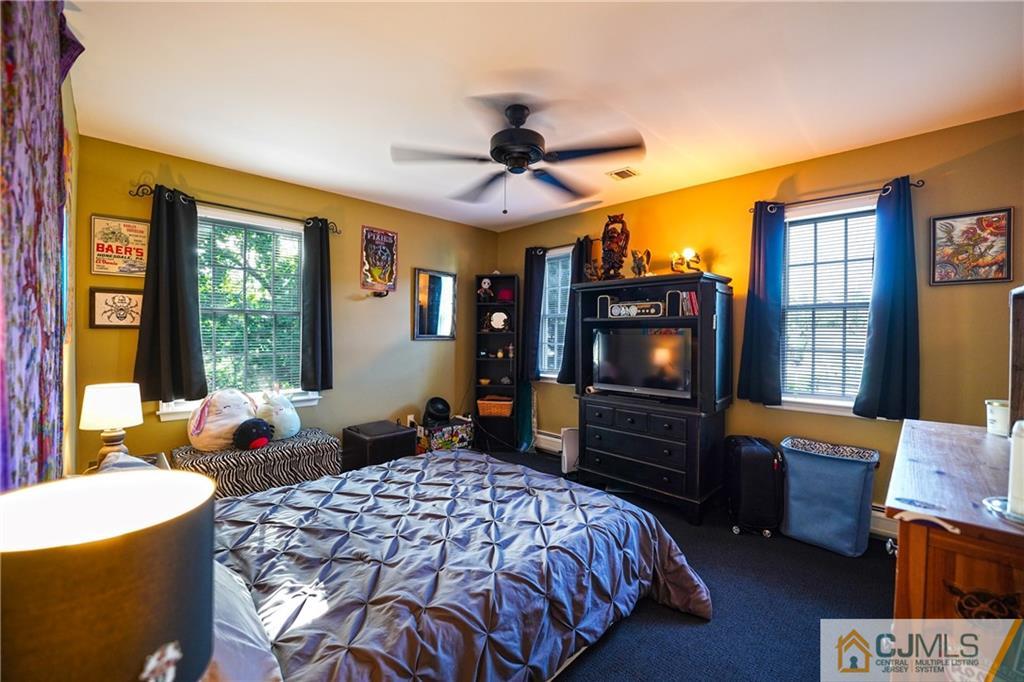 36 Starkin Road Edison, NJ 08837 - Photo 25 of 45 a bedroom with a bed dresser and a window