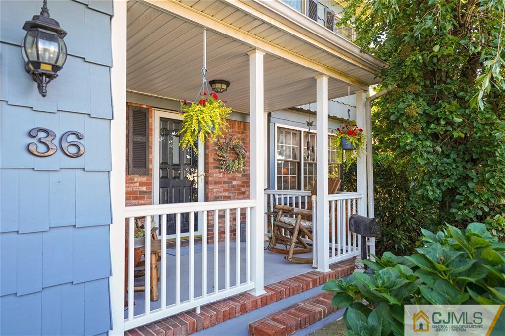 36 Starkin Road Edison, NJ 08837 - Photo 3 of 45 a view of a house with a small yard and wooden floor and fence
