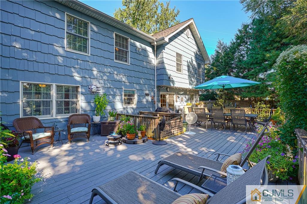 36 Starkin Road Edison, NJ 08837 - Photo 42 of 45 a view of a backyard with sitting area and furniture