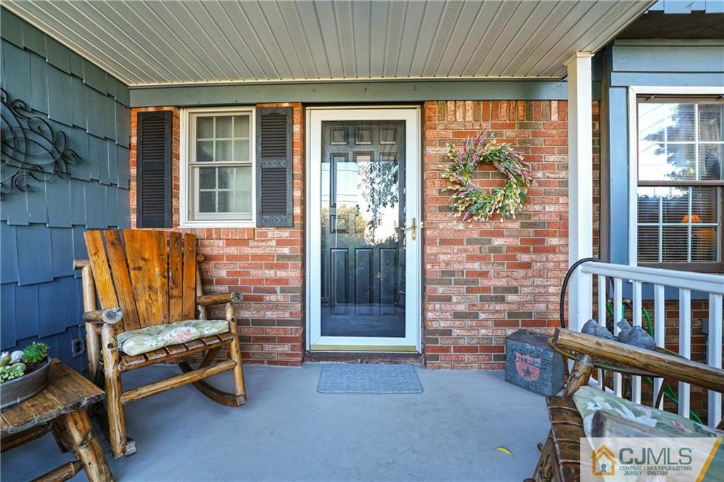 36 Starkin Road Edison, NJ 08837 - Photo 5 of 45 a living room with furniture and a window
