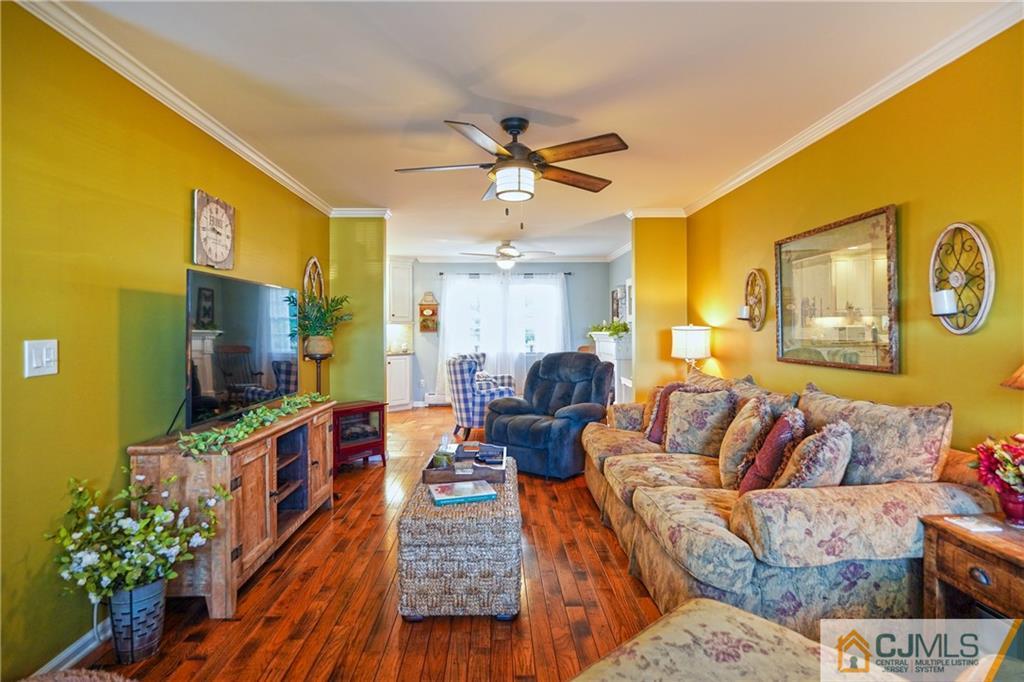36 Starkin Road Edison, NJ 08837 - Photo 8 of 45 a living room with furniture and a flat screen tv
