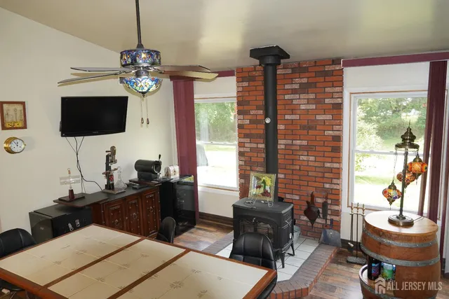 a livingroom with a couch and a flat screen tv