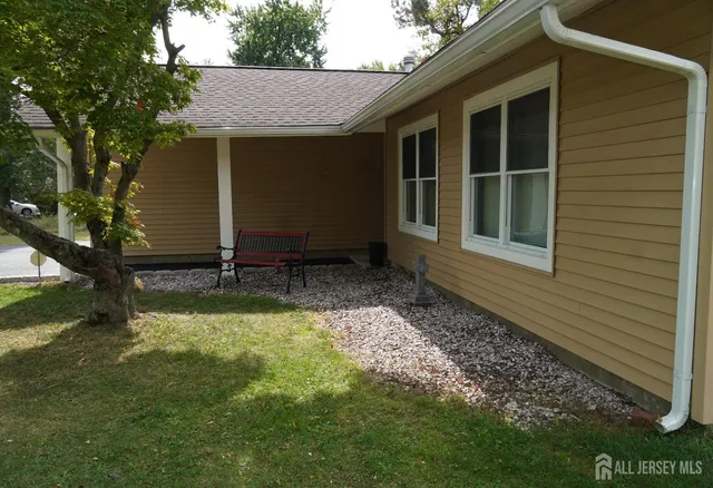 a house view with a backyard space