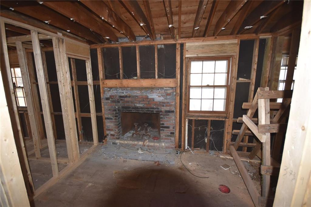 3002 Pangborn Road Decatur, GA 30033 - Photo 3 of 7 a view of an empty room with a fireplace