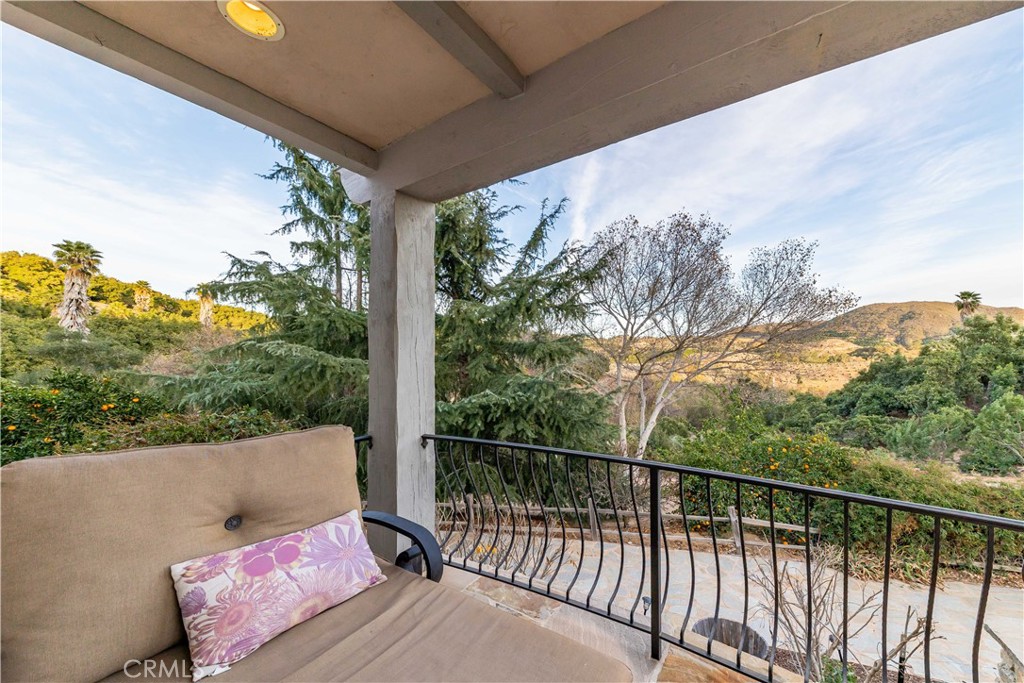 26525 Carancho Road Temecula, CA 92590 - Photo 26 of 64 a view of a two chair in the balcony