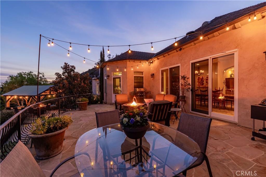 26525 Carancho Road Temecula, CA 92590 - Photo 52 of 64 a view of a chairs and tables in patio