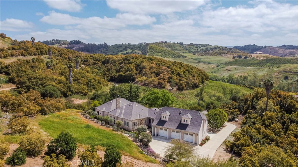 26525 Carancho Road Temecula, CA 92590 - Photo 60 of 64 an aerial view of residential houses with outdoor space and river