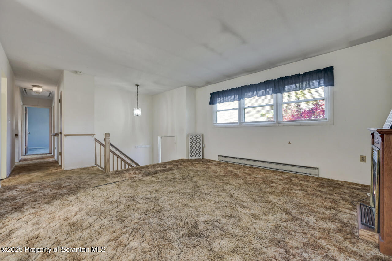 446 Maple Grove Road Moscow, PA 18444 - Photo 11 of 51 a view of an empty room and window