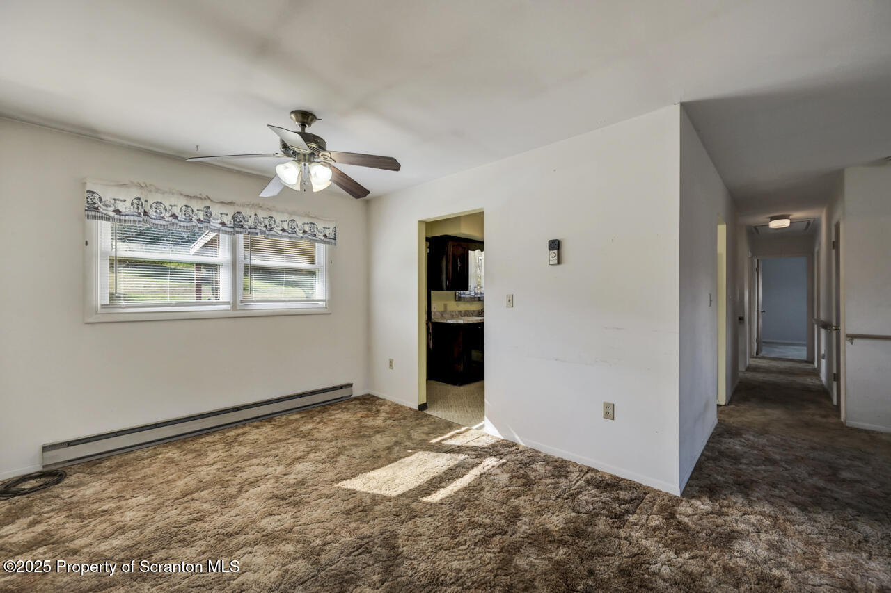 446 Maple Grove Road Moscow, PA 18444 - Photo 15 of 51 a view of an empty room with a window