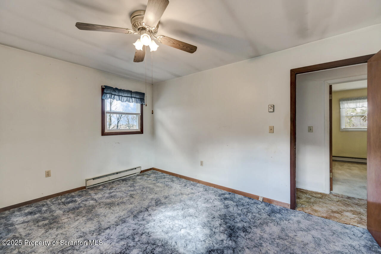 446 Maple Grove Road Moscow, PA 18444 - Photo 25 of 51 wooden floor in an empty room