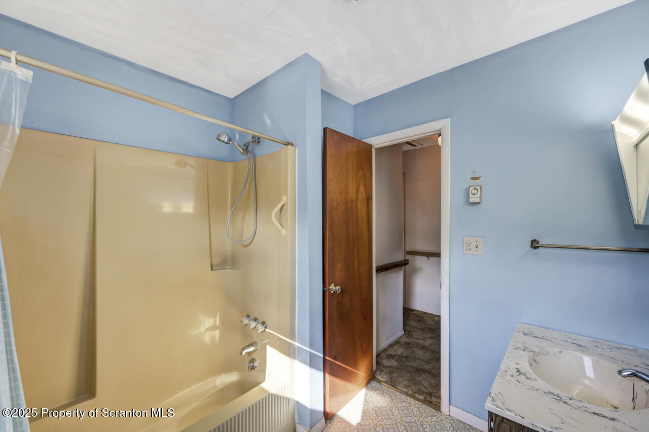 446 Maple Grove Road Moscow, PA 18444 - Photo 29 of 51 a bathroom with a shower and a toilet