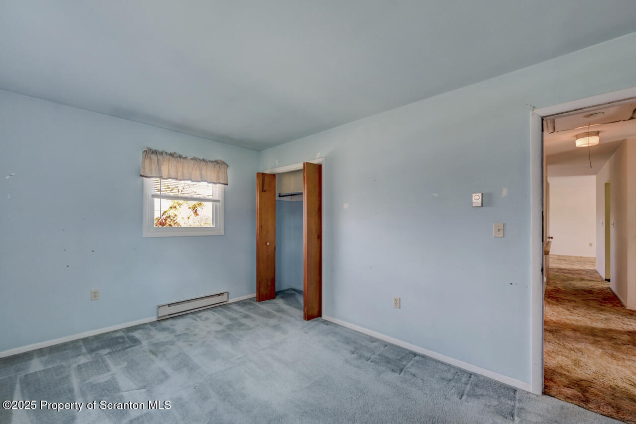 446 Maple Grove Road Moscow, PA 18444 - Photo 31 of 51 a view of an empty room and a window
