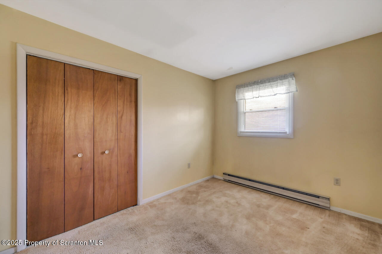446 Maple Grove Road Moscow, PA 18444 - Photo 34 of 51 a view of an empty room and window