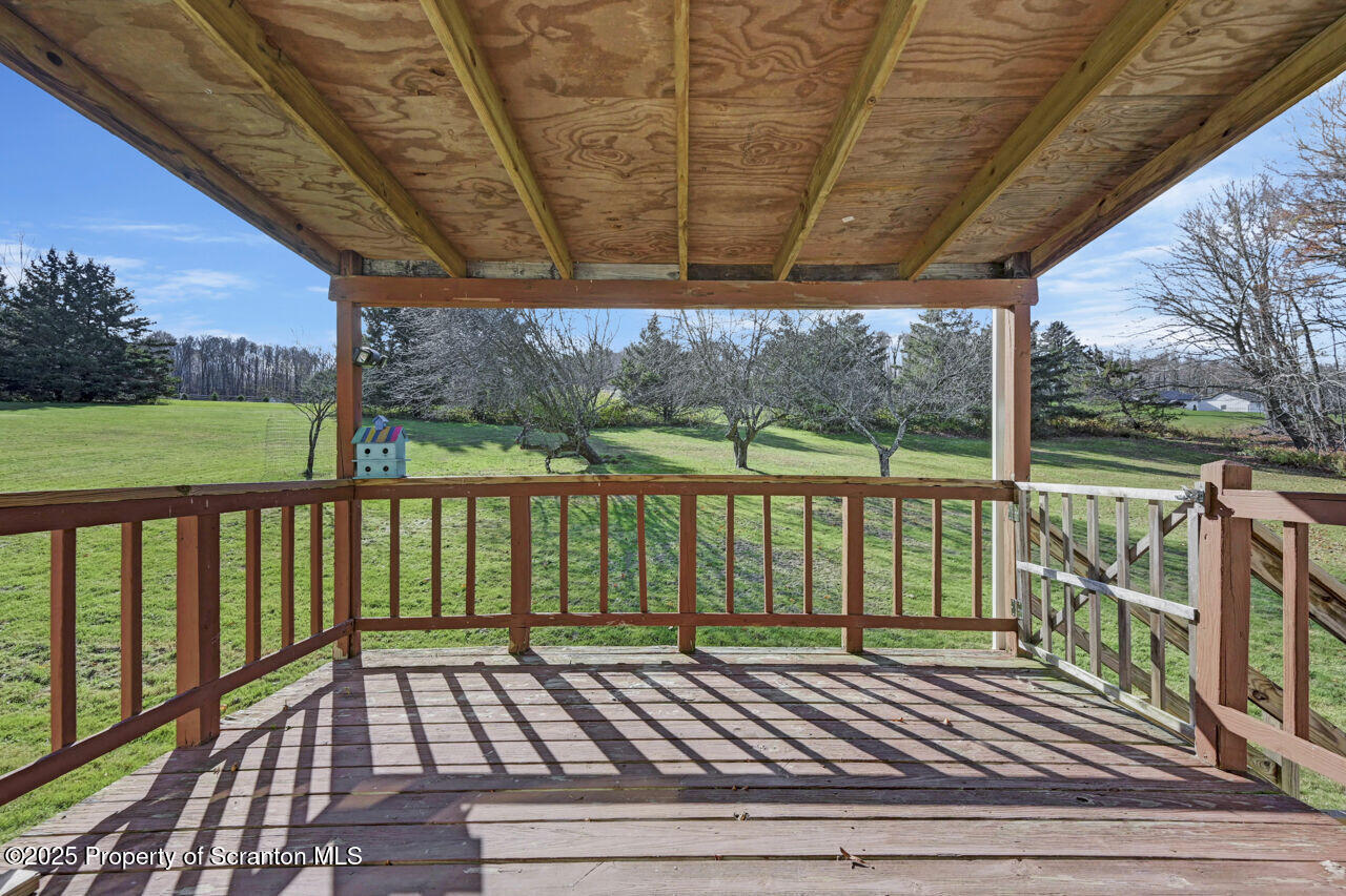 446 Maple Grove Road Moscow, PA 18444 - Photo 44 of 51 a view of balcony with wooden floor