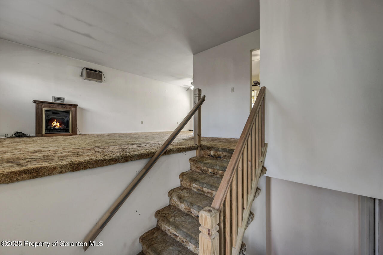 446 Maple Grove Road Moscow, PA 18444 - Photo 8 of 51 a view of entryway and kitchen