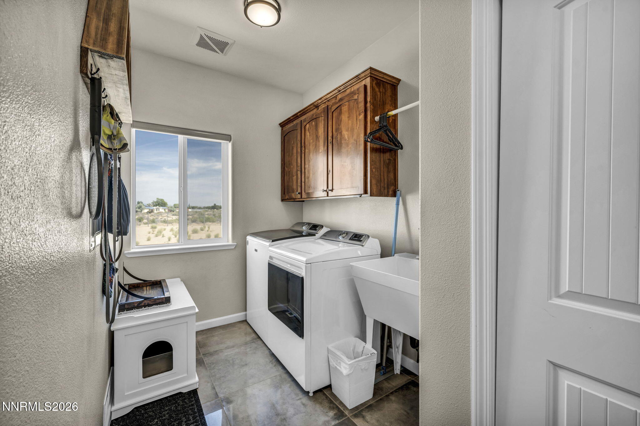 1286 Sky Ridge Drive Fallon, NV 89406 - Photo 41 of 49 a utility room with dryer and washer