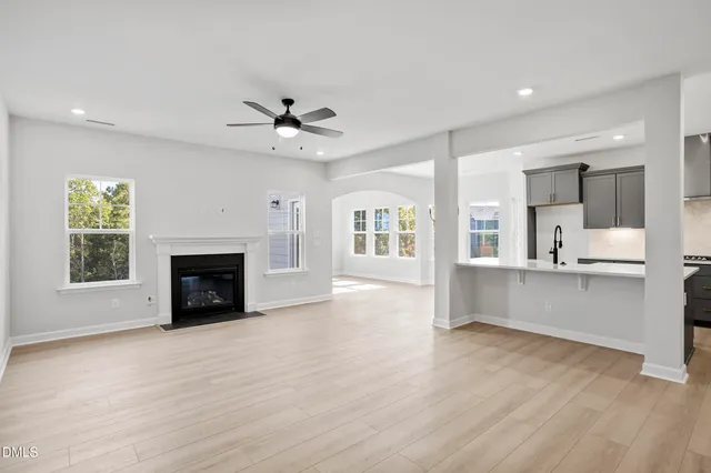 a view of kitchen with furniture and fireplace