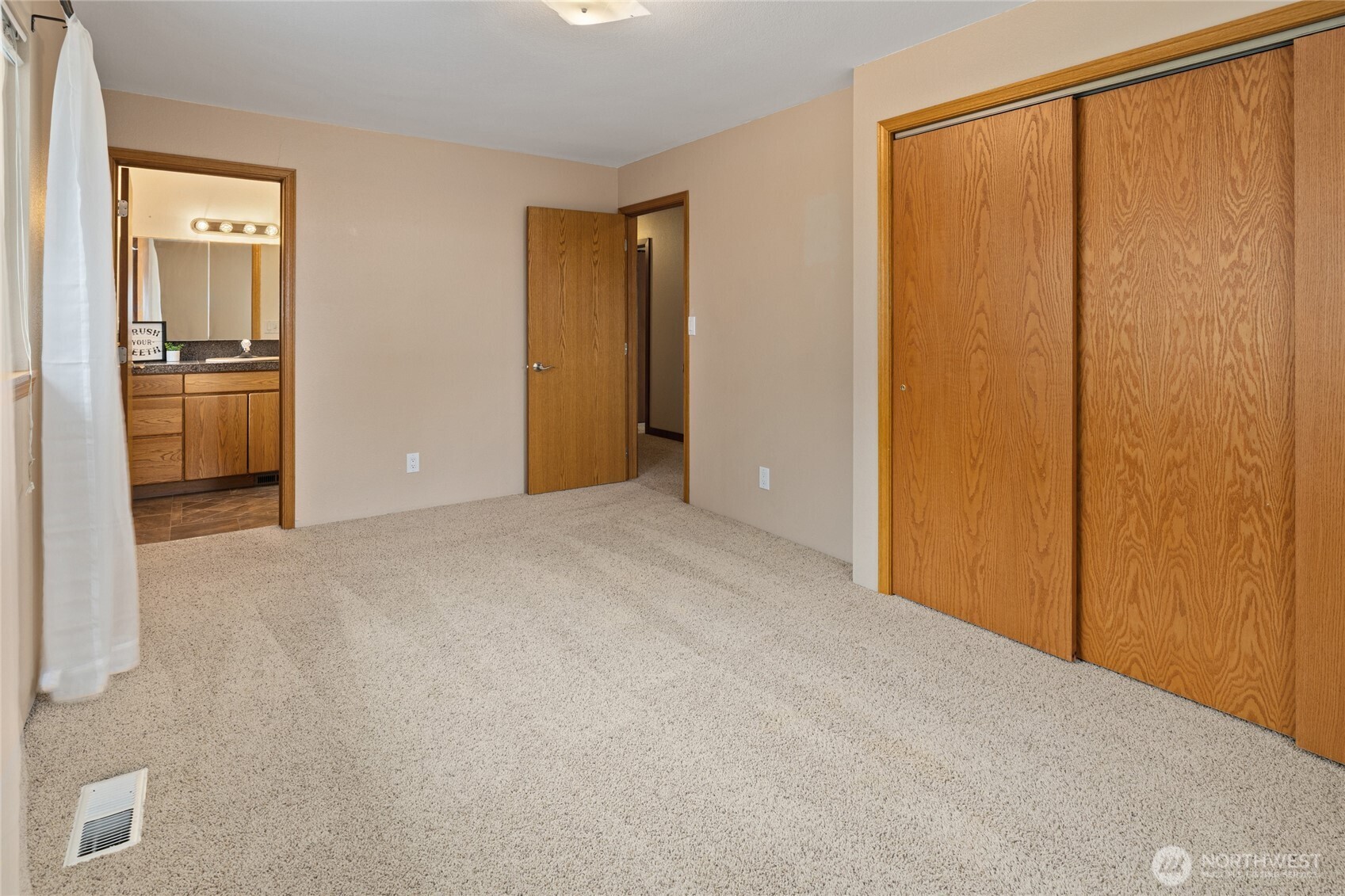 709 South Matthews Road Ellensburg, WA 98926 - Photo 32 of 40 a view of a kitchen with an empty space and a window