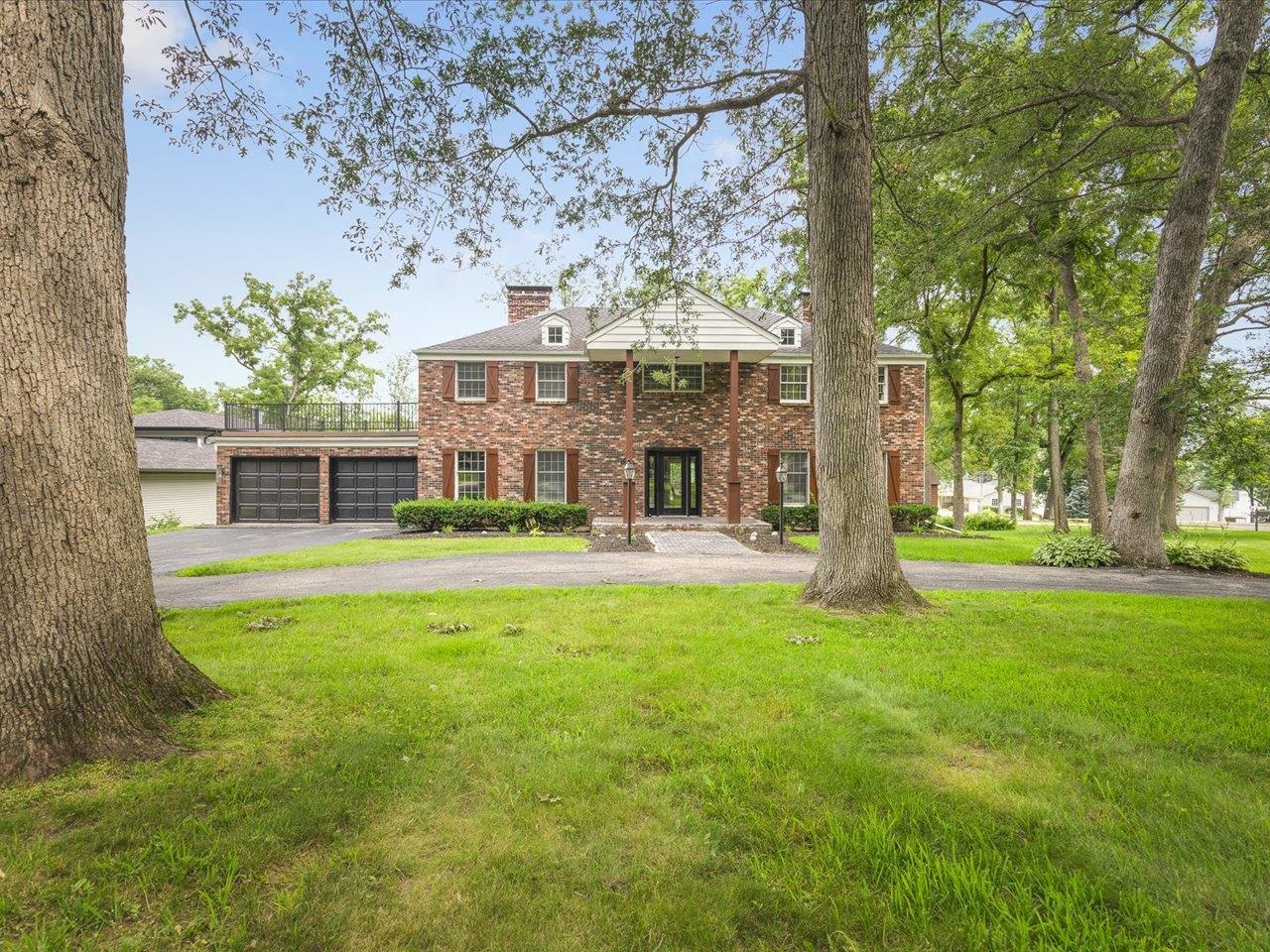 1927 Baintree Road Lake Summerset, IL 61019 - Photo 14 of 71 a front view of a house with a yard