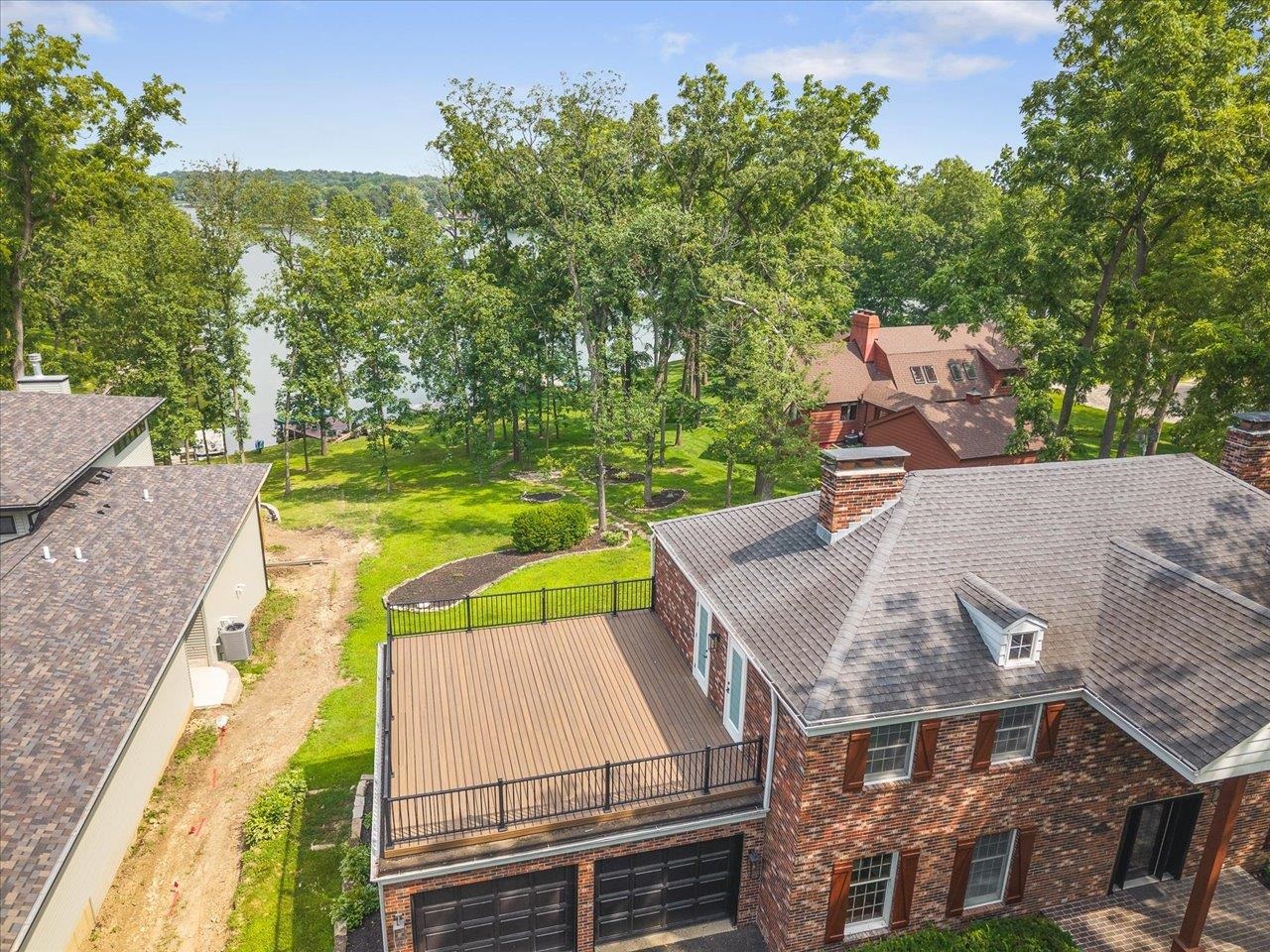1927 Baintree Road Lake Summerset, IL 61019 - Photo 51 of 71 an aerial view of a house with swimming pool and large trees