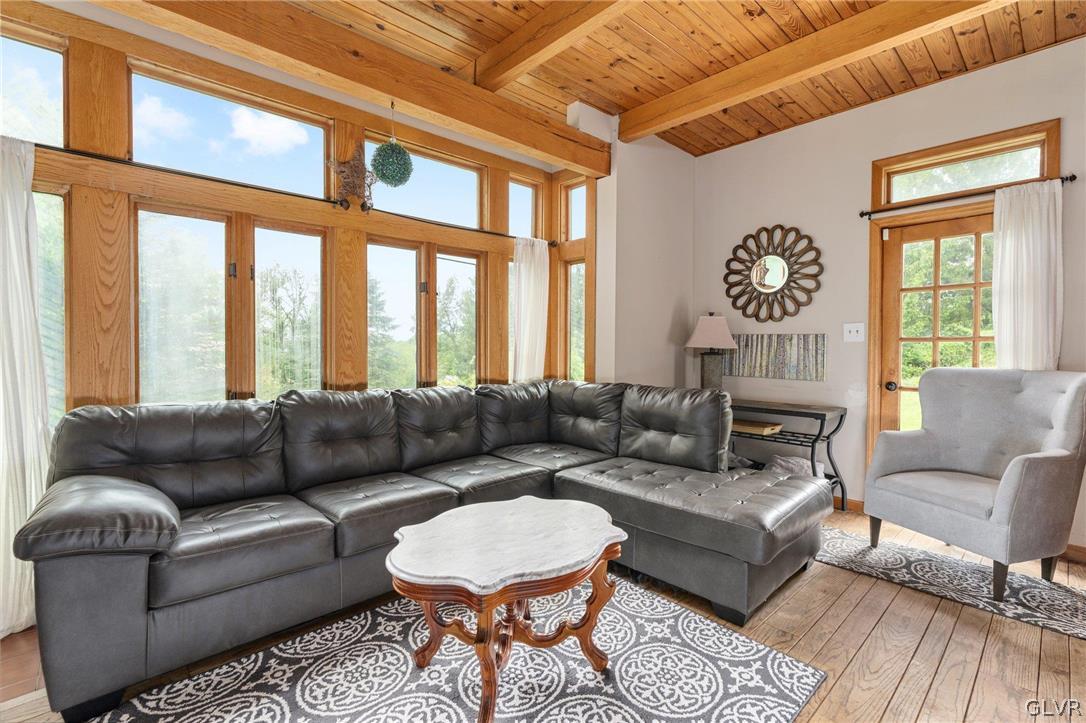 9325 Danner Road New Tripoli, PA 18066 - Photo 16 of 50 a living room with furniture and a large window