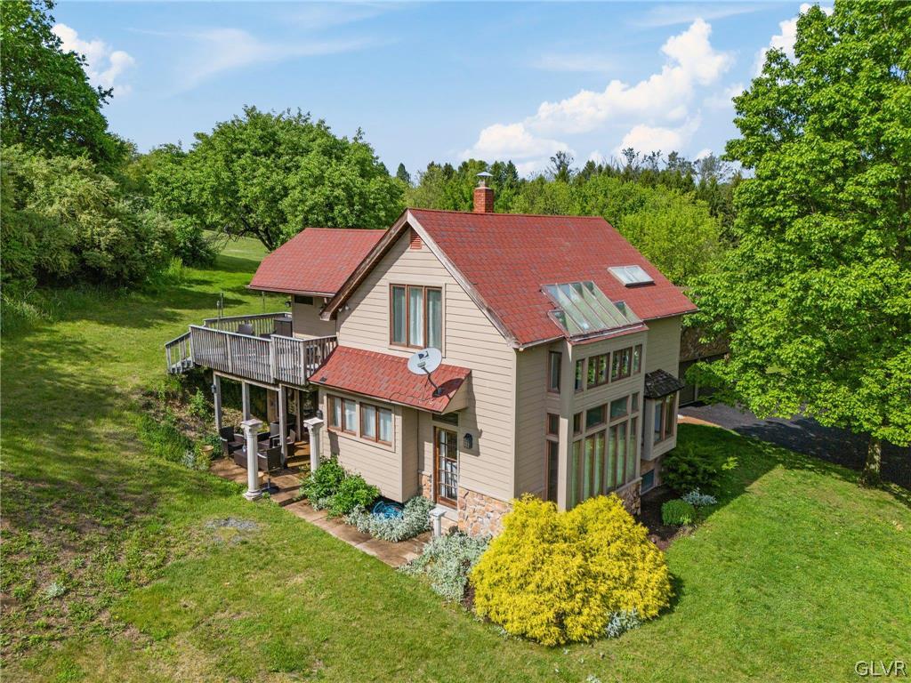 9325 Danner Road New Tripoli, PA 18066 - Photo 2 of 50 a view of house with a yard