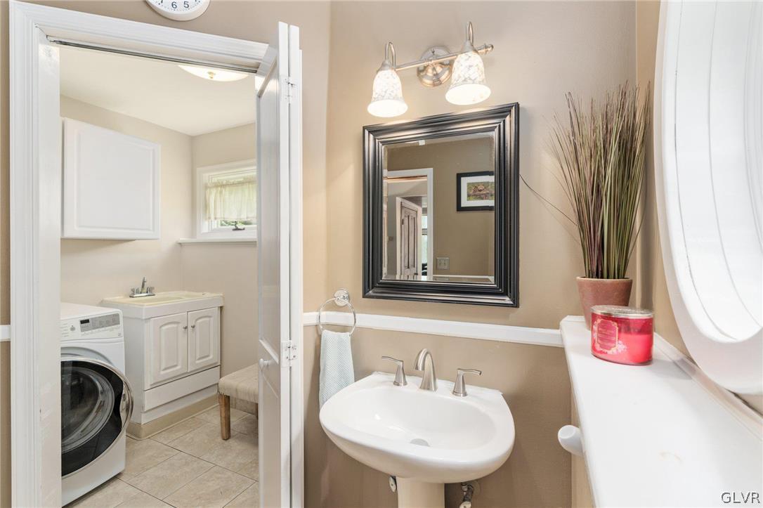 9325 Danner Road New Tripoli, PA 18066 - Photo 23 of 50 a bathroom with a toilet sink and mirror