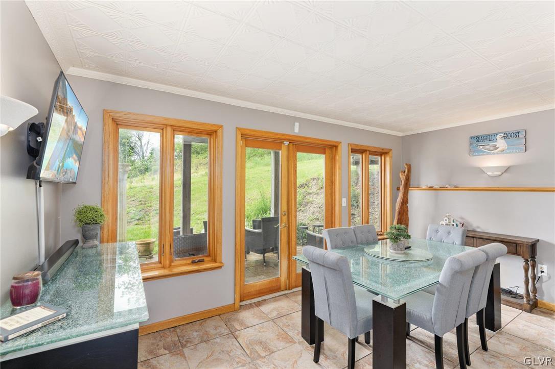 9325 Danner Road New Tripoli, PA 18066 - Photo 26 of 50 a view of a dining room with furniture window and outside view