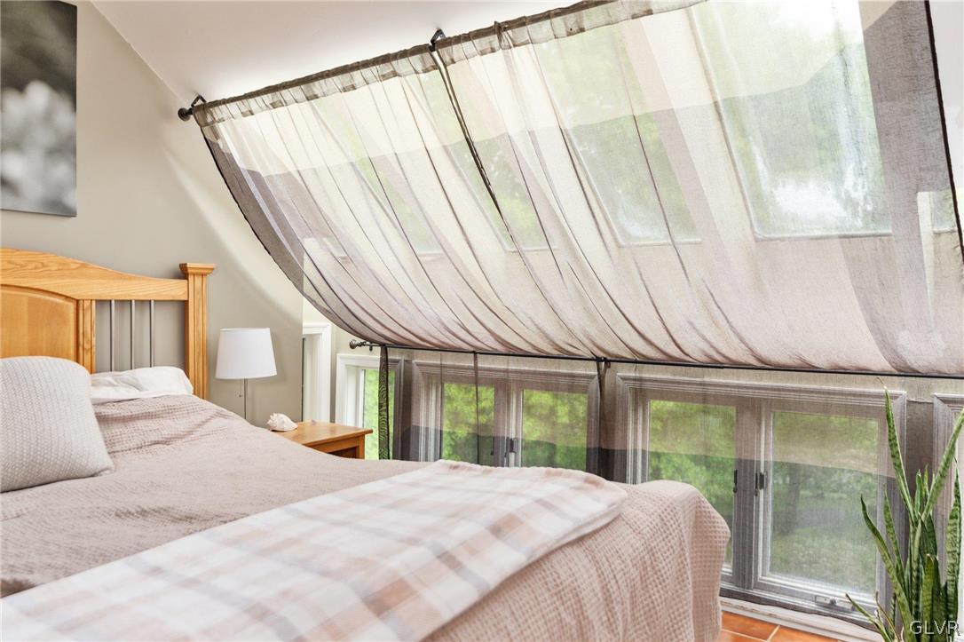 9325 Danner Road New Tripoli, PA 18066 - Photo 31 of 50 a bedroom with a bed and a window